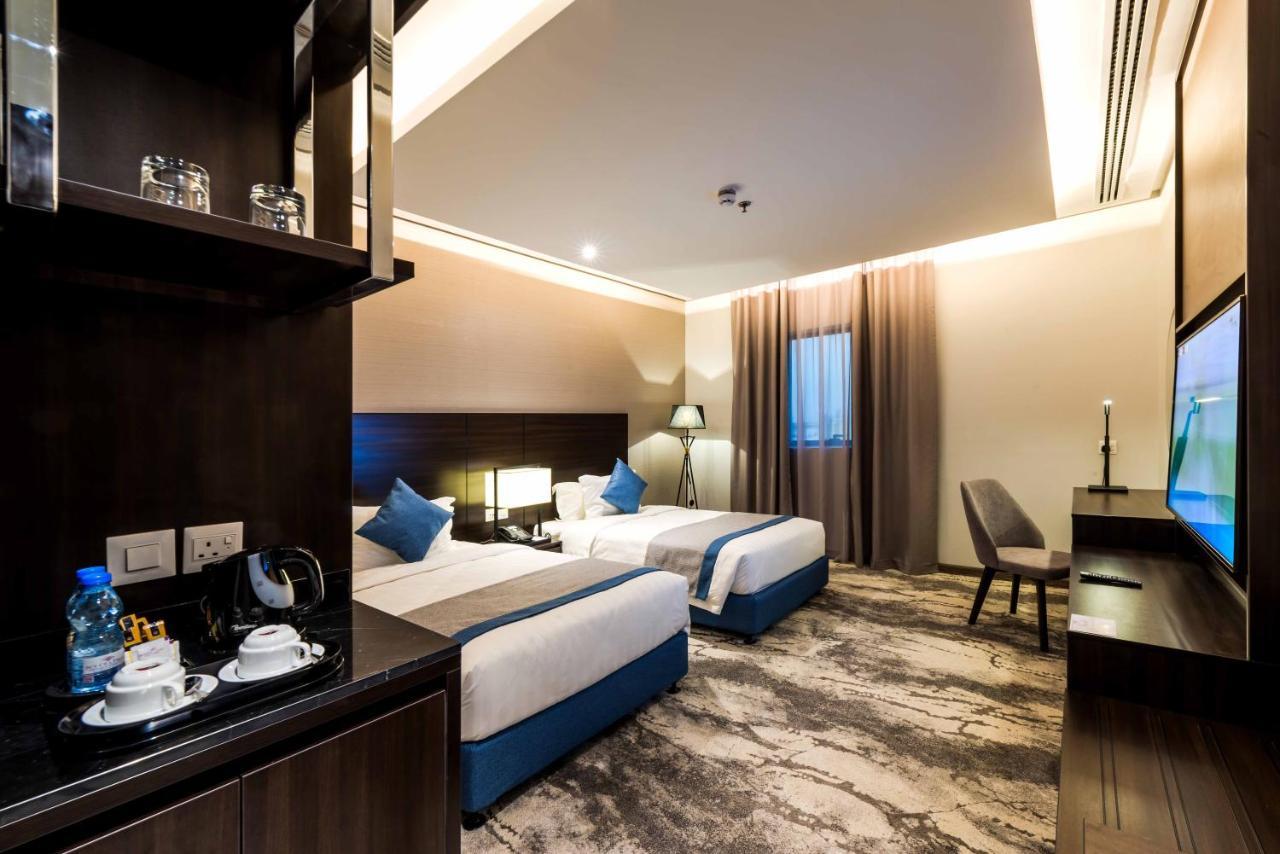 Aber Al Munsiyah Hotel Рияд Екстериор снимка